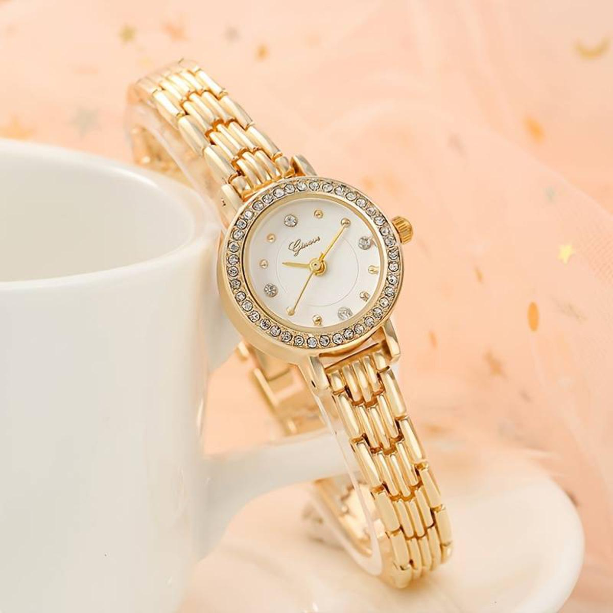 Ladies golden stone watch